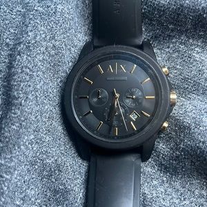 Armani exchange watch black and gold rubber material